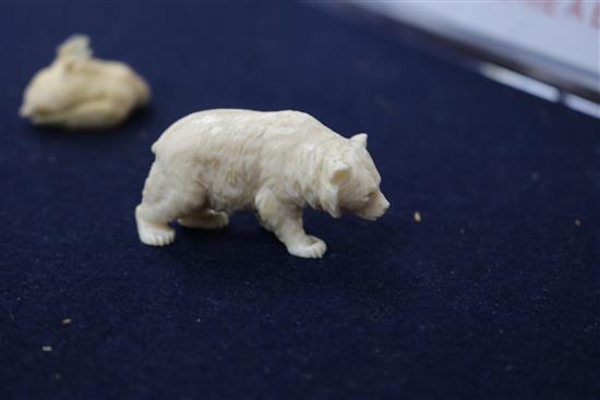 A carved ivory animal group